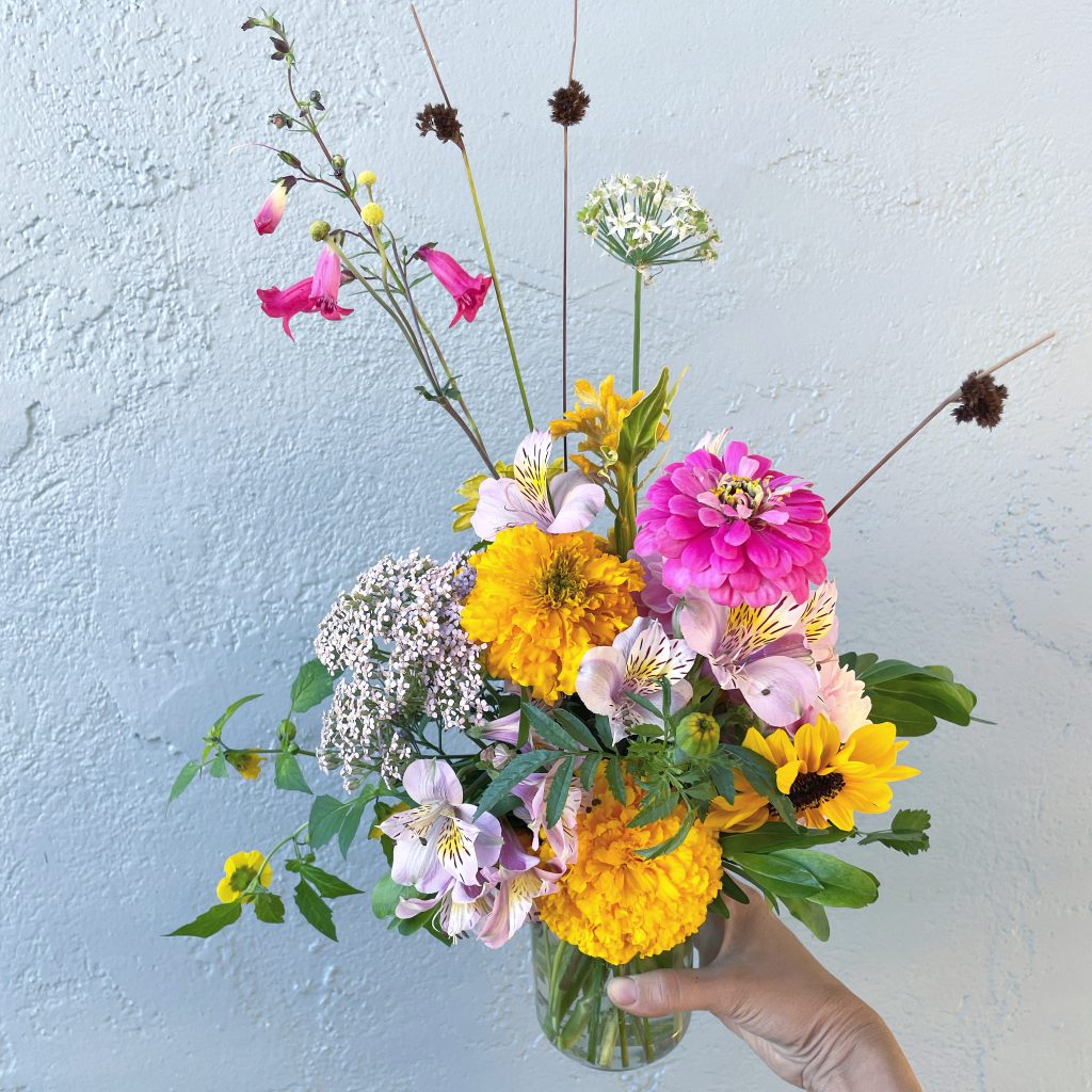 Petite vase with summer flowers (zinnias, marigolds, penstemon)
